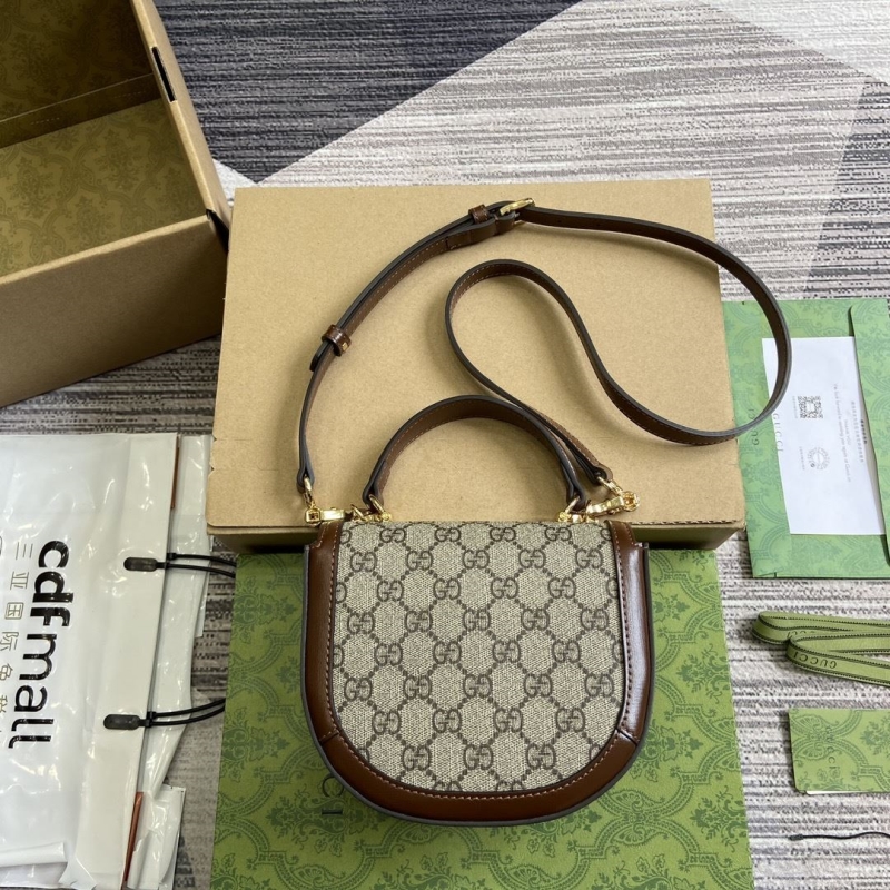 G*u*i top handle bags